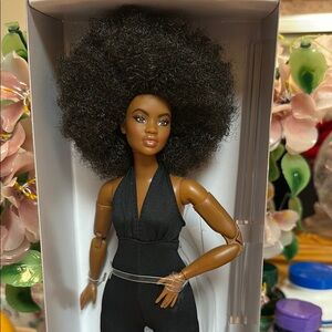 This is Elle Barbie Looks #2. Black Fashion Doll with Curly Hair.